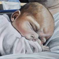 Baby auf Papas Bauch